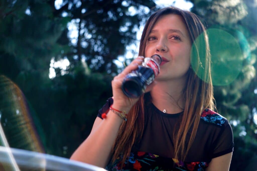 Girl drinking coke