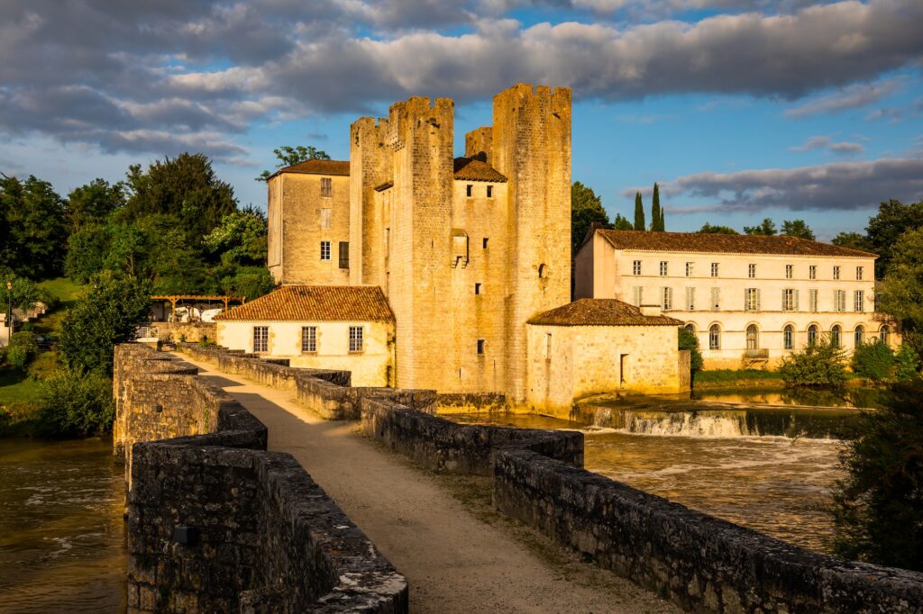 Moulin des Tours- fortified mill in Barbaste, France, at sunset